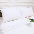 NTBAY 4 Pack Zippered Waterproof Queen Pillow Protectors, Super Soft Quiet Zip Pillow Protectors, 20x30 Inches Jersey Pure White Waterproof Pillow