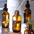 AOZITA 4 Pack, 2 Oz Dropper Bottles with 1 Funnel & 4 Labels - Essential Oils Bottles for Health, Personal Care & Beauty - 60Ml Thick Dark Amber
