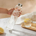 Glass Water Bottle 25Oz with Felt Sleeve - Borosilicate Glass - Leakproof Lid - BPA Free - Ideal for Work, Travel & Gym (Sand Brown)
