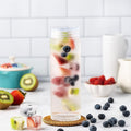 Glass Water Bottles - 4 Pack Wide Mouth Juice Bottles with Clear Lids for Juicing, Smoothies, Fruit Water, Teas, Beverage Storage - 16Oz,