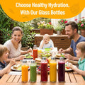 Clear Glass Bottles with Lids 18 Oz, Reusable Glass Water Bottles with Stainless Steel Cap for Juicing, Refrigerator,100% Leak Proof, BPA Free,