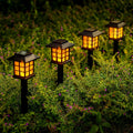 GIGALUMI Solar Lights for Outside,8 Pack Flickering Flame LED Solar Outdoor Lights, Waterproof Solar Garden Lights Maintain 10 Hours of Lighting