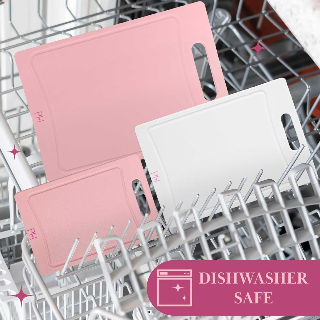 Paris Hilton Cutting Boards, Dual-Sided Cutting Board Set with Built-In Juice Grooves, Easy-Grip Handles, Heavy-Duty Plastic Made without BPA, Dishwasher Safe, 3-Piece Set, Pink and Cream